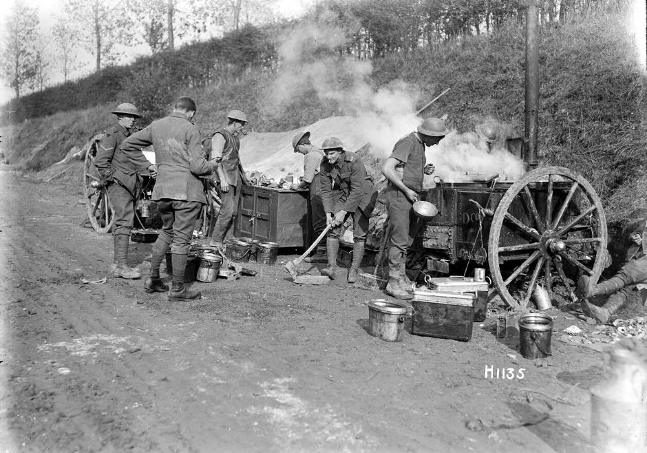 New Zealand cooks prepare a meal for troops