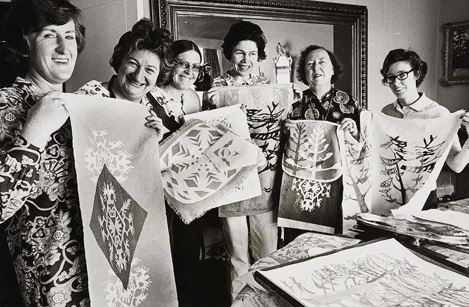 Zonta members with wall hangings