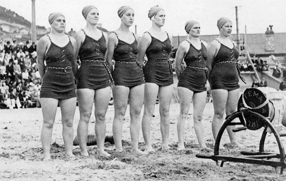 Group of lifesavers on beach