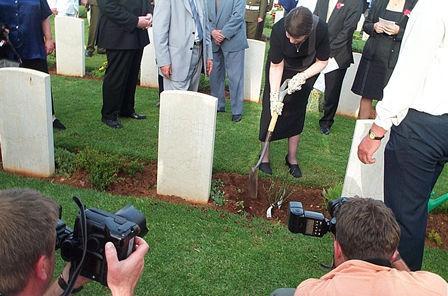 Helen Clark planting rose at Crete, 2001